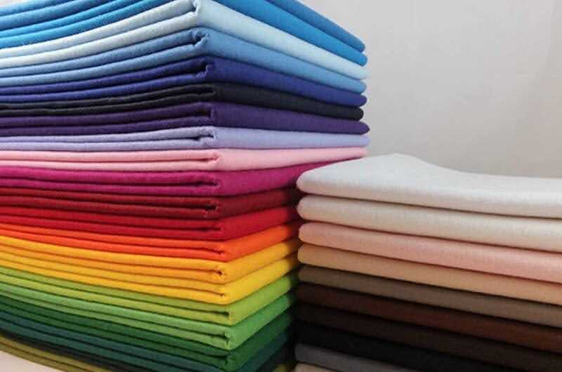 Chất liệu vải ảnh hưởng đến giá may đồng phục