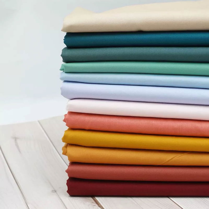 Vải cotton thường được ưu tiên lựa chọn để may đồng phục spa