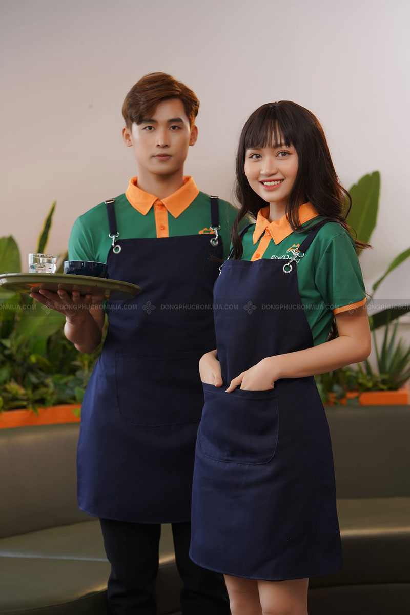 Áo đồng phục nhà hàng xanh lá cây đậm cổ phối cam