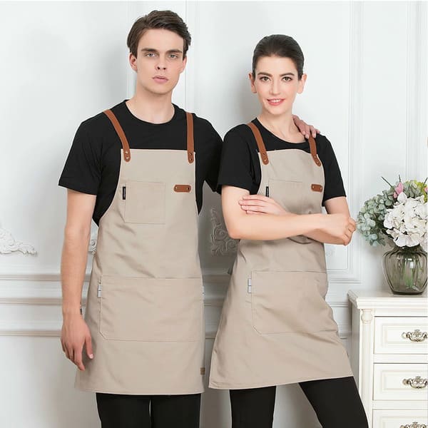 Tạp dề đồng phục cửa hàng thú cưng thường là kiểu tạp dề dáng dài