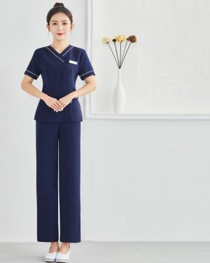 Đồng phục massage màu tím than viền trắng