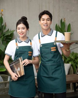 Đồng phục tạp dề dáng yếm màu xanh trẻ trung hiện đại