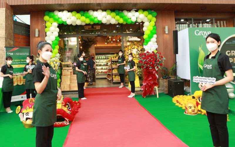 may tạp dề tiệm bán trái cây